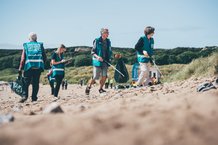 Group of people beach cleaning